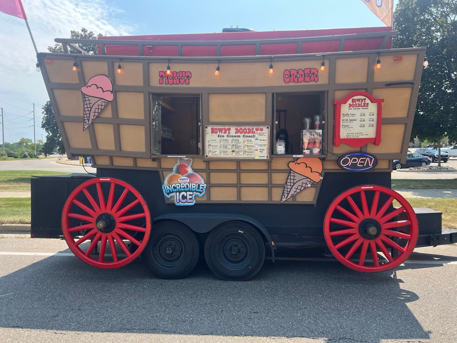 The Howdy Doodles coach side on, service windows open and the menu board hung between them